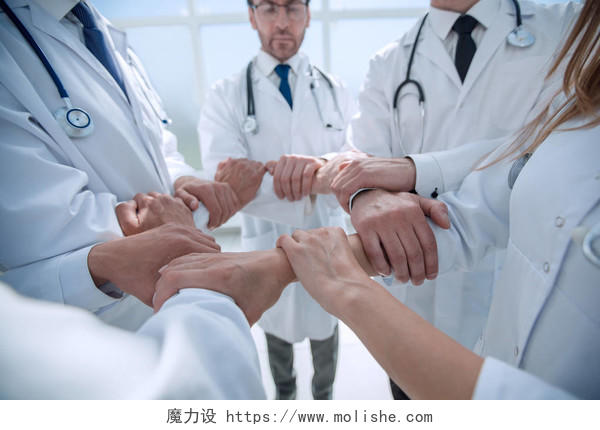 医生手握手图团队加油团结握手企业团结团结人物医生的手医生手势